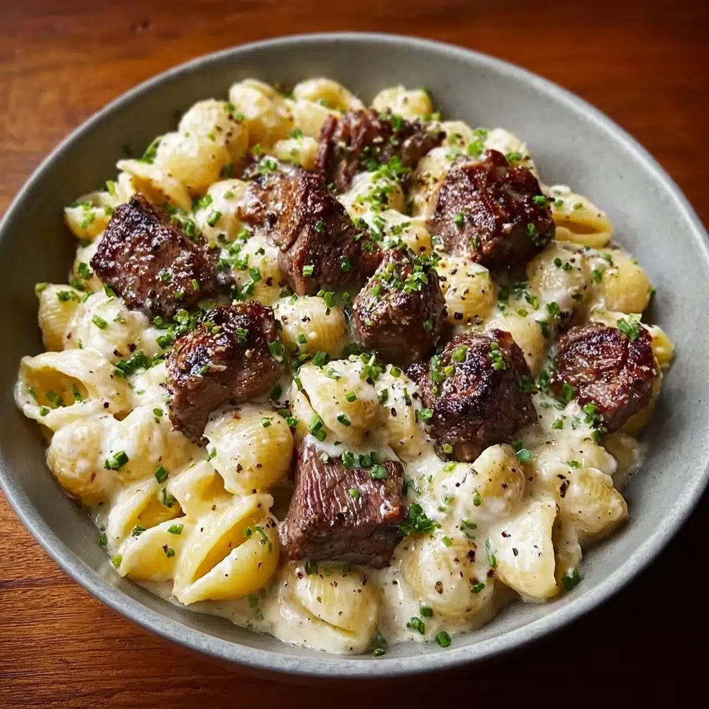 Steak Bites and Shell Pasta in Garlic Butter Alfredo Sauce Recipe - Recipe Image