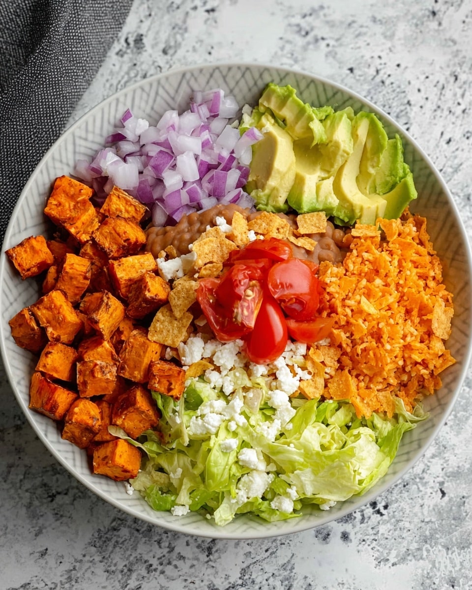 A bowl with six separate layers arranged side by side includes bright orange roasted sweet potato cubes on the left, followed by small purple chopped red onion pieces, soft white crumbled cheese, light green sliced avocado, orange Mexican style rice, and shredded pale green lettuce mixed with crushed light yellow tortilla chips. In the center of the bowl, a small portion of light brown refried beans is topped with bright red cherry tomato halves. The bowl is white with a subtle herringbone pattern and sits on a white marbled surface. Photo taken with an iphone --ar 4:5 --v 7