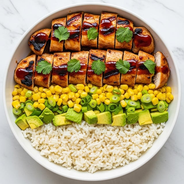 A white bowl filled with three main layers: the bottom layer is white rice with visible grains, the middle layer has bright green avocado cubes and yellow corn mixed with green scallions, and the top layer consists of grilled chicken pieces glazed with a shiny dark brown sauce and garnished with small green cilantro leaves. The chicken pieces are arranged in neat rows across the bowl, with slight char marks showing on the surface. The whole dish sits on a white marbled texture surface. Photo taken with an iphone --ar 4:5 --v 7