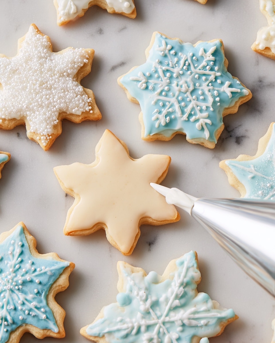 The image shows star and snowflake-shaped sugar cookies on a white marbled surface. Some cookies have a smooth layer of white icing sprinkled with tiny white sugar beads, while others have a pale blue icing base with detailed white or blue icing designs like dots and symmetrical lines forming snowflake patterns. One cookie is being decorated with white icing from a piping bag, showing a simple cross design being created on the pale cookie. The cookie edges are golden brown, showing a baked texture underneath the smooth icing. photo taken with an iphone --ar 4:5 --v 7